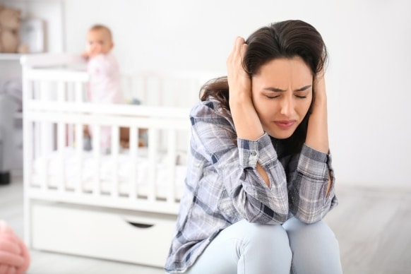 Postpartum Depression: Causes, Symptoms & Treatment